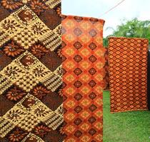 a display of fabric or batik with a design on it photo