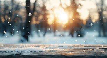 Sunset Over Snowy Forest With Falling Snowflakes on Wooden Table in Winter photo