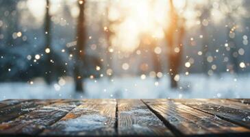 Sunset Over Snowy Forest With Falling Snowflakes on Wooden Table in Winter photo