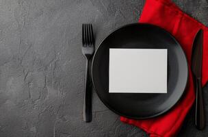 Black Plate and Forks on Gray Surface photo