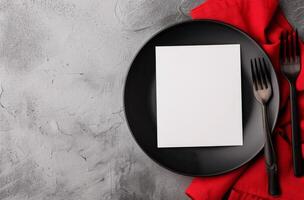 Black Plate and Forks on Gray Surface photo