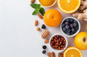 Citrus Fruits, Berries, and Honey on White Background photo