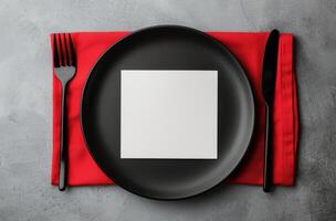 Black Plate and Forks on Gray Surface photo