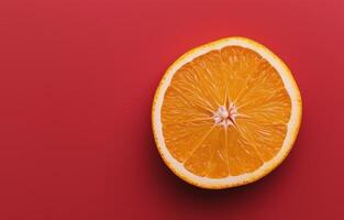 Orange Slice on Red Background photo