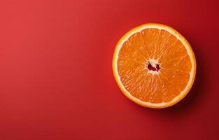 Orange Slice on Red Background photo