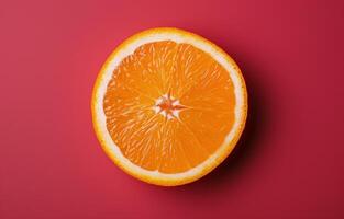 Orange Slice on Red Background photo