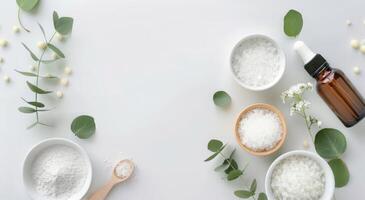 Natural Bath Salts and Oil on White Background photo