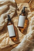 Amber Bottles With Blank Labels on Fabric photo