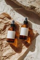 Amber Bottles With Blank Labels on Fabric photo