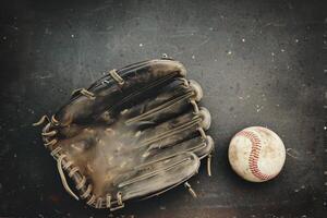 Worn Baseball Glove and Ball photo