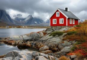 Red Cabin on Rocky Coast in Norway photo