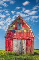 Red Barn With Patchwork Design photo