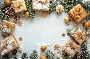 Gold Christmas Gifts and Evergreen Branches on Snowy White Background photo