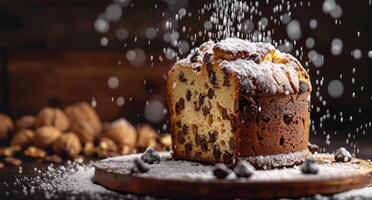 Chocolate Chip Bread Loaf With Powdered Sugar Sprinkles on Wooden Table photo