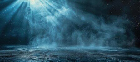 Dramatic Blue Light Shining Through Smoke and Dust on a Dark Surface photo