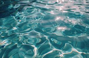 Closeup View of Rippling Blue Water in a Swimming Pool on a Sunny Day photo
