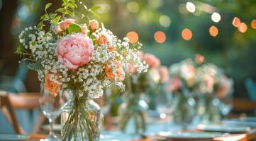 Pink Flower Centerpieces With String Lights at an Outdoor Wedding Reception photo