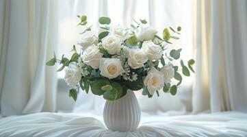 White Roses in a Ceramic Vase Near a Window photo