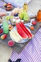 Picnic on the beach at sunset in the style of boho photo