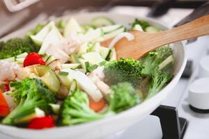 Cooking process of vegetable stew photo