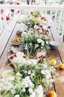 Appetizing breakfast on table on terrace photo