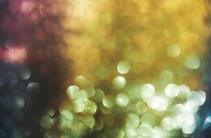 Abstract background with specks of light photo