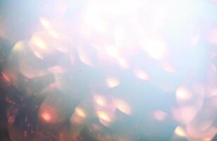 Abstract background with specks of light photo