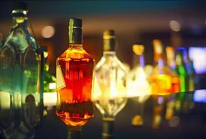 Bar counter with bottles in blurred background photo
