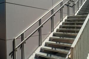 staircase at the building in the sun photo