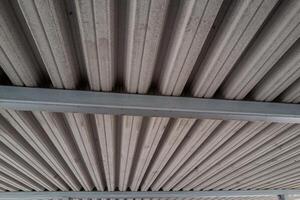 large concrete canopy with supports from below photo