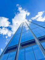 high rise building in office area blue sky with clouds background . High quality photo