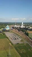 Aerial view of coal mine with coal heaps and trucks waiting for loading, Poland video