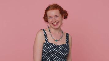 Redhead woman showing tongue making faces at camera, fooling around, joking, aping with silly face video
