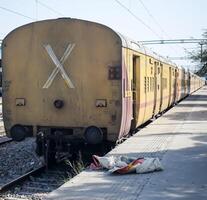 Delhi, India, July 09 2024 - Indian railway express train at departure from Anand Vihar railway station during morning time, Colourful Express train at Delhi railway station photo