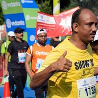 New Delhi, India - July 15 2024 - Vedanta Delhi Half Marathon race after covid in which marathon participants about to cross the finish line, Delhi Half Marathon 2023 photo