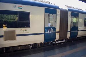 Delhi, India, June 09 2024 - Vande Bharat Express train going from Delhi towards Dehradun from Anand Vihar railway station, Vande Bharat fastest Train of India photo