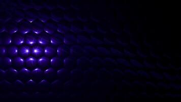Abstract blue futuristic hexagon surface pattern, resembling a honeycomb with an offset effect. Blue glowing sci-fi background. Hexagonal wall moving in waves with a neon effect. Seamless 3D looped an video