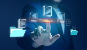 File Transfer Protocol FTP, data transfer, and backup with applications using online networks. Businessmen display virtual screen to share files stored in secure iCloud. photo