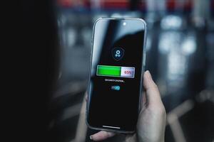 Security system installation, data security protection. Smartphone screen showing installation application with online network photo