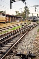 View of train Railway Tracks from the middle during daytime at Amritsar railway station in India, Train railway track view, Indian Railway junction, Heavy industry photo