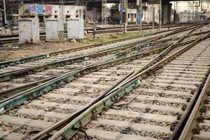 View of train Railway Tracks from the middle during daytime at Amritsar railway station in India, Train railway track view, Indian Railway junction, Heavy industry photo