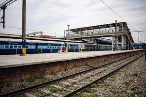 View of train Railway Tracks from the middle during daytime at Amritsar railway station in India, Train railway track view, Indian Railway junction, Heavy industry photo