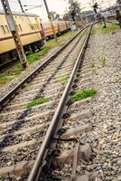 View of train Railway Tracks from the middle during daytime at Amritsar railway station in India, Train railway track view, Indian Railway junction, Heavy industry photo