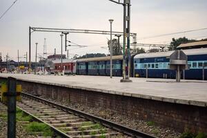 View of train Railway Tracks from the middle during daytime at Amritsar railway station in India, Train railway track view, Indian Railway junction, Heavy industry photo