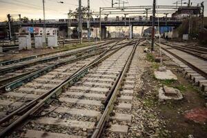 View of train Railway Tracks from the middle during daytime at Amritsar railway station in India, Train railway track view, Indian Railway junction, Heavy industry photo