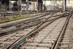 View of train Railway Tracks from the middle during daytime at Amritsar railway station in India, Train railway track view, Indian Railway junction, Heavy industry photo