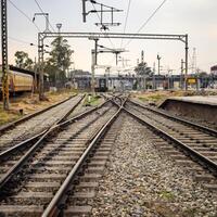 View of train Railway Tracks from the middle during daytime at Amritsar railway station in India, Train railway track view, Indian Railway junction, Heavy industry photo