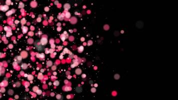 pink and white blurry circles and stars in black background. loop. suitable for festive designs, greeting cards, party invitations, and abstract background video
