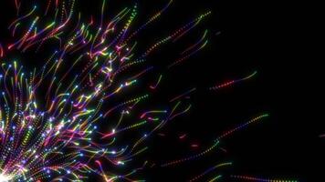 Rainbow colored glowing dots form wavy lines on a black background. loop. Suitable for vibrant abstract backgrounds in design projects video