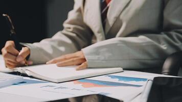 Business meetings to analyze investment strategies and brainstorm sales plans for a more profitable business. video